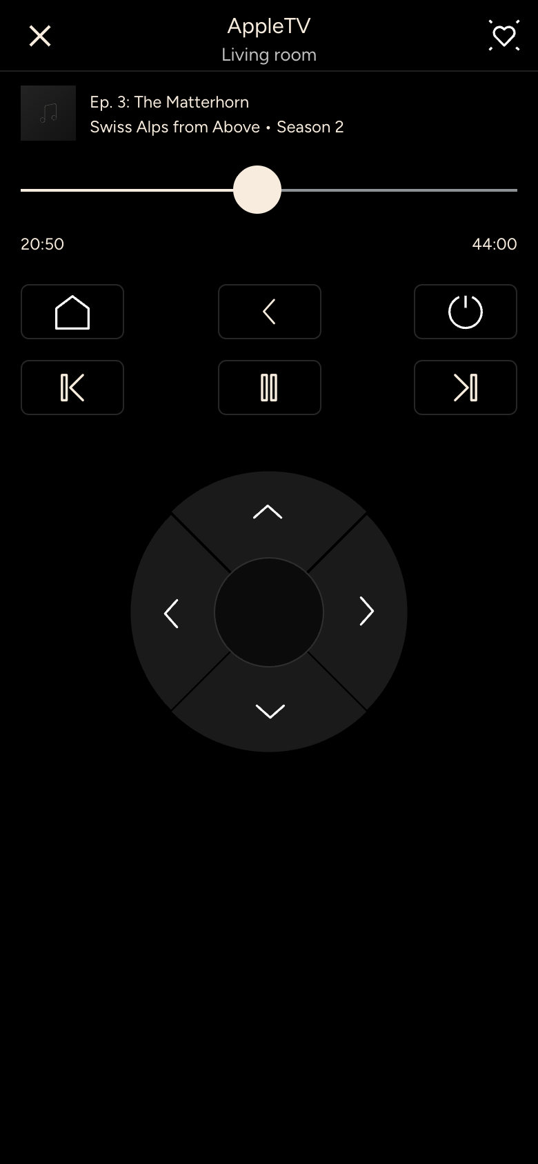 Apple TV with a program playing and touch remote